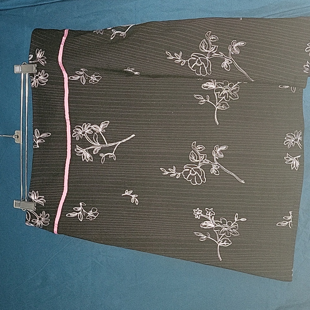 Black skirt , pink flowers pattern
